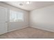 Bedroom with carpet and a window providing natural light at 2000 N 36Th St # 41, Phoenix, AZ 85008