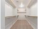 Walk-in closet with carpet, shelving, and ample storage space at 2000 N 36Th St # 41, Phoenix, AZ 85008