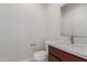 This powder room features a modern vanity with quartz countertop and brushed nickel faucet at 2000 N 36Th St # 41, Phoenix, AZ 85008