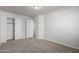 Bedroom featuring neutral carpet and closet entry at 2000 N 36Th St # 8, Phoenix, AZ 85008