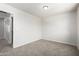 Bedroom with neutral carpet and an entry to another room at 2000 N 36Th St # 8, Phoenix, AZ 85008