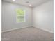 Bright bedroom with natural light streaming through the window at 2000 N 36Th St # 8, Phoenix, AZ 85008