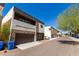 Modern homes with two-car garages, stone accents, and well-maintained landscaping at 2000 N 36Th St # 8, Phoenix, AZ 85008