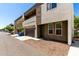 Contemporary home with a two-car garage and stone detailing on the facade at 2000 N 36Th St # 8, Phoenix, AZ 85008