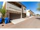 Modern homes with two-car garages, stone accents, and well-maintained landscaping at 2000 N 36Th St # 8, Phoenix, AZ 85008
