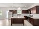 Modern kitchen featuring stainless steel appliances, a large island, and stylish cabinetry at 2000 N 36Th St # 8, Phoenix, AZ 85008