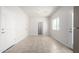 Bright living room with neutral tile flooring and a doorway to another room at 2000 N 36Th St # 8, Phoenix, AZ 85008
