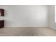Spacious living room with tiled floors and abundant natural light from large windows at 2000 N 36Th St # 8, Phoenix, AZ 85008