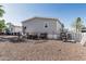 View of home and property with gravel landscaping and exterior storage areas at 2060 N Center St # 133, Mesa, AZ 85201