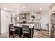 Stylish kitchen with stainless steel appliances, a kitchen island, and elegant countertops at 2060 N Center St # 133, Mesa, AZ 85201