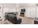 Cozy living room with plush carpet, comfortable seating, and a bright window at 2060 N Center St # 133, Mesa, AZ 85201