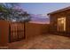 Stone and stucco home with private patio and gate at 2062 W Roy Rogers Rd, Phoenix, AZ 85085
