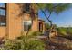 Exterior view of home featuring well-maintained landscaping and a stone accent entrance at 2062 W Roy Rogers Rd, Phoenix, AZ 85085