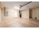 Spacious two car garage with epoxy flooring, neutral paint, and room for storage at 2062 W Roy Rogers Rd, Phoenix, AZ 85085