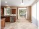 Kitchen area showcasing the stainless appliances, granite countertops and tile flooring at 2062 W Roy Rogers Rd, Phoenix, AZ 85085