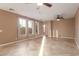 Spacious open floor plan with tile flooring, neutral walls, and bright, natural light at 2062 W Roy Rogers Rd, Phoenix, AZ 85085