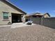 Charming backyard patio with shade, perfect for relaxation and gatherings at 22325 N 185Th Ave, Surprise, AZ 85387