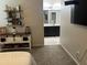 Cozy bedroom view showcasing walk-in closet and ensuite bathroom at 22325 N 185Th Ave, Surprise, AZ 85387