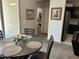 Charming dining area featuring modern table setting, art, and neutral décor at 22325 N 185Th Ave, Surprise, AZ 85387