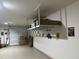 Clean garage with epoxied floor and overhead storage at 22325 N 185Th Ave, Surprise, AZ 85387