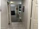 Hallway with tiled flooring leading to the living room at 22325 N 185Th Ave, Surprise, AZ 85387