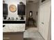 View from the kitchen featuring modern appliances and dark cabinets at 22325 N 185Th Ave, Surprise, AZ 85387