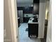Kitchen featuring stainless steel appliances, granite countertops, and tile flooring at 22325 N 185Th Ave, Surprise, AZ 85387