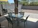 Outdoor patio featuring outdoor furniture and a private backyard with desert landscaping at 22325 N 185Th Ave, Surprise, AZ 85387