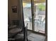 Outdoor patio with a table, chairs, and a view of the backyard at 22325 N 185Th Ave, Surprise, AZ 85387