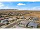 Beautiful aerial shot of a residential area, highlighting the layout of the homes and desert surroundings at 22657 N 184Th Ln, Surprise, AZ 85387