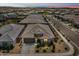 New home with desert landscaping, a tile roof, and a two car garage, nestled in a growing community at 22657 N 184Th Ln, Surprise, AZ 85387