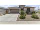 Charming single-story home featuring low-maintenance landscaping, neutral paint, and a welcoming front-facing two-car garage at 22657 N 184Th Ln, Surprise, AZ 85387