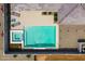 Aerial view of backyard featuring a sparkling pool, a spa, and a lounging area at 22657 N 184Th Ln, Surprise, AZ 85387