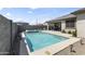 Backyard featuring a pristine pool and spa, complemented by an inviting outdoor patio at 22657 N 184Th Ln, Surprise, AZ 85387