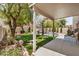 Inviting backyard with lush green lawn, spiral staircase, and serene landscaping at 2746 E Fawn Dr, Phoenix, AZ 85042