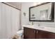 Well-lit bathroom with a modern mirror, vanity, and shower, creating a clean and functional space at 2746 E Fawn Dr, Phoenix, AZ 85042