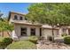 Charming home with a well-manicured front yard, mature trees, and tile roof at 2746 E Fawn Dr, Phoenix, AZ 85042