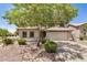 Home exterior with desert landscaping, and mature trees in the front yard at 2746 E Fawn Dr, Phoenix, AZ 85042