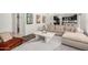 Open-concept living room with modern decor, connected to the kitchen at 2746 E Fawn Dr, Phoenix, AZ 85042