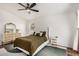 Well-lit bedroom offers ample space and natural light with modern decor at 2746 E Fawn Dr, Phoenix, AZ 85042