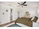 Bright bedroom featuring modern furniture and a view into a walk-in closet at 2746 E Fawn Dr, Phoenix, AZ 85042