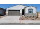 Charming single-story home featuring a two-car garage, low maintenance landscaping, and a welcoming entryway at 3550 N Camden Dr, Florence, AZ 85132