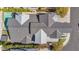 Overhead view of the home, highlighting the pool, roof design, and outdoor living spaces at 3718 E Sells Dr, Phoenix, AZ 85018