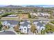 Expansive aerial shot showcases the neighborhood's luxury homes and a vacant lot at 3718 E Sells Dr, Phoenix, AZ 85018