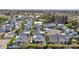 High-angle shot reveals the layout of modern residences with gray roofs and circular driveways at 3718 E Sells Dr, Phoenix, AZ 85018