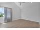 A spacious bedroom featuring vaulted ceilings, natural light, and wood floors at 3718 E Sells Dr, Phoenix, AZ 85018
