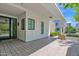 Inviting outdoor space featuring a covered patio, tile flooring, and stylish architecture at 3718 E Sells Dr, Phoenix, AZ 85018