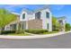 Stunning two-story home boasts a stone facade, balcony, and manicured landscaping at 3718 E Sells Dr, Phoenix, AZ 85018