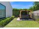 Secluded backyard hot tub with a pergola, creating a private and relaxing retreat at 3718 E Sells Dr, Phoenix, AZ 85018