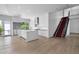 Modern kitchen with a center island, stainless steel appliances, and sleek cabinetry at 3718 E Sells Dr, Phoenix, AZ 85018
